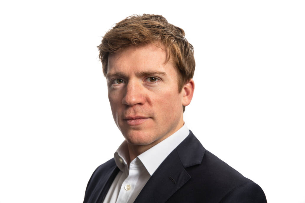 Corporate headshots and portraits of man in white shirt and dark jacket by portrait photographer Andy Barnham