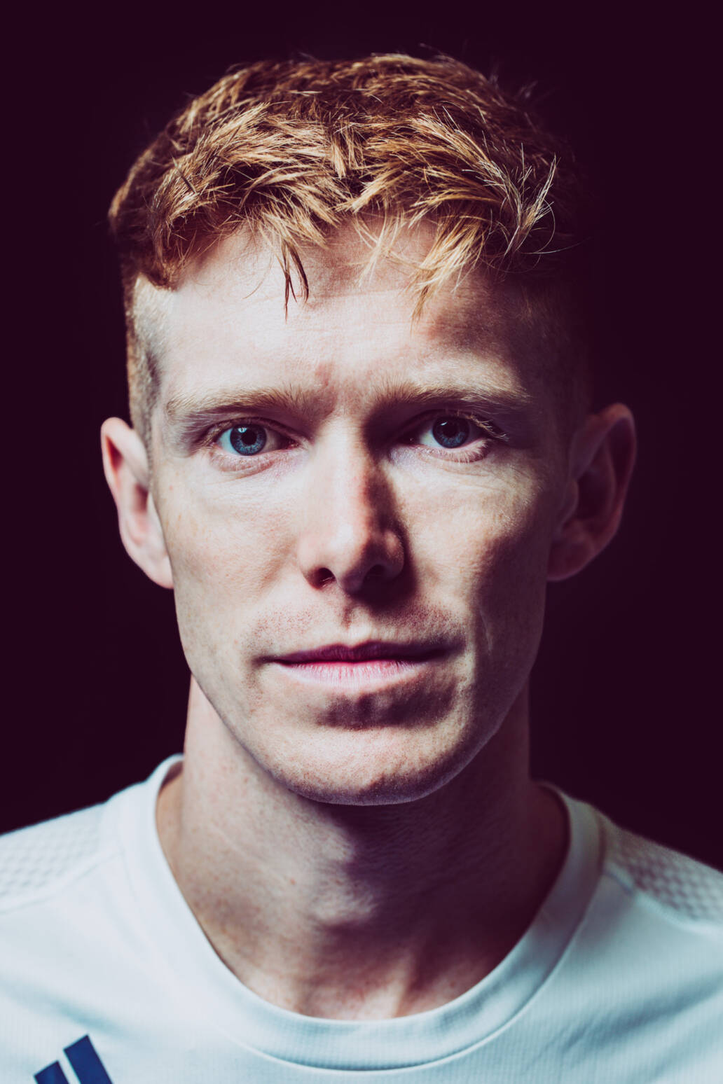 Close up colour portrait of British Olympian Tom Bosworth for Portraits of Pride